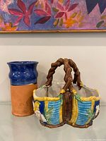 Front view of both pottery pieces showing size and finish