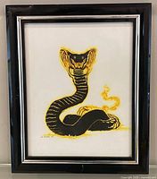 Full close-up of the artwork showing cobra image and frame detail