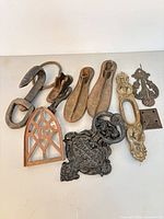 Group shot of all nine metal hardware items