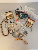 Overview of entire jewellery lot laid out on table