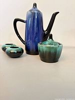 Blue drip glaze coffee pot, green sugar bowl, two green bowls