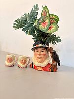 Front view of all three ceramic planters