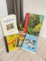 Group shot of all six books showing covers and bindings