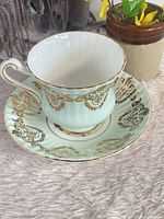 Teacup on saucer showing overall design and color