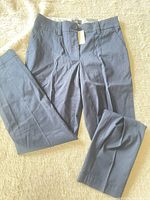 Front view of dark blue Talbots chino pant with tag attached