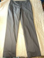 Front view of black Banana Republic Martin Fit dress pants laid flat