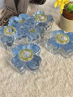 Group view of two single and one double Colony Crystal Dogwood blue candle holders