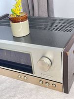 Front and top view of Kenwood KT-4005 tuner showing overall condition and controls