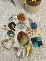 All pendants laid out showing variety and materials