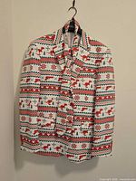 Blazer and necktie hanging, showing overall pattern