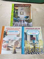 All three Jonathan Adler Happy Chic hardcover books front covers visible
