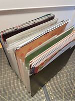 Accordion folio filled with assorted patterned paper viewed from top