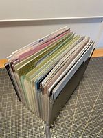 Side view of folio showing thickness and papers