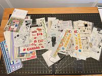 Overview of all sticker packs spread on table