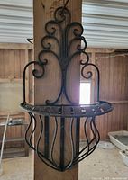 Front view showing scroll design and basket shape