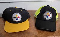 Both Pittsburgh Steelers hats side by side