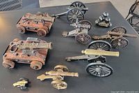 Group shot of all replica cannons and cannonballs