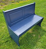 Front angled view of blue wooden bench