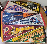 All six pennants layered to show team graphics