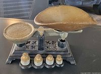 full view of assembled balance scale with weights