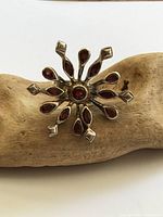 Front view of starburst garnet ring