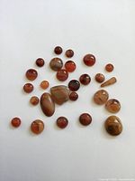 Group view of all polished agate cabochons