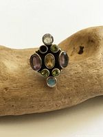 Front view of sterling silver cluster ring with multiple semiprecious stones
