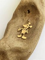 Front view of gold Mickey Mouse charm pendant