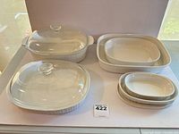 Full set showing all ceramic bases and two glass lids