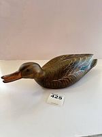 Side view of full wooden duck decoy
