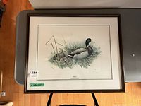 Full view of framed print showing artwork, mat, and frame