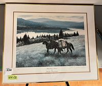 Overall framed print showing art, mat, frame, edition number 17/150 visible