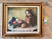 Full view of framed still life painting
