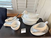 Group shot of all eight pieces on table