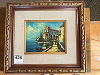 Full view of framed painting with matting