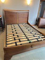 Full view of assembled sleigh bed frame with slat system