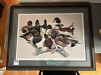 Full view of framed print showing ducks, mat, and frame