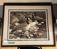 Full view of framed print showing geese scene, mats and frame