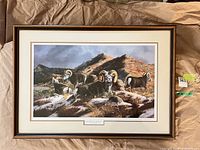 Framed print showing full artwork, frame, mat