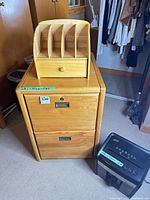 Overall view of file cabinet, desktop organizer and shredder