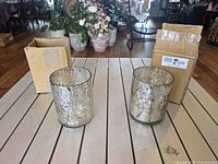 Two Hofland silver mercury glass vases with boxes
