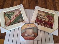 All three framed prints with corner protectors