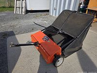Full view of Agri-Fab 44" lawn sweeper with hopper and hitch arm