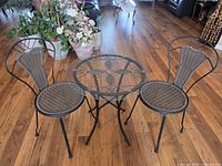 Entire bistro set showing table and two chairs