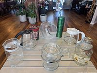 Group shot showing all eight items on slatted surface