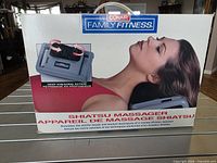 Front of retail box showing Conair Family Fitness Shiatsu Massager