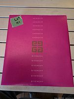 Front of closed pink Givenchy presentation box