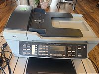 Front left view of HP OfficeJet J5750 showing overall condition and control panel