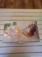 Closed retail box showing brand and fruit design imagery