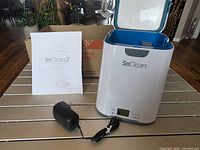 SoClean 2 unit, power adapter, manual and original carton
